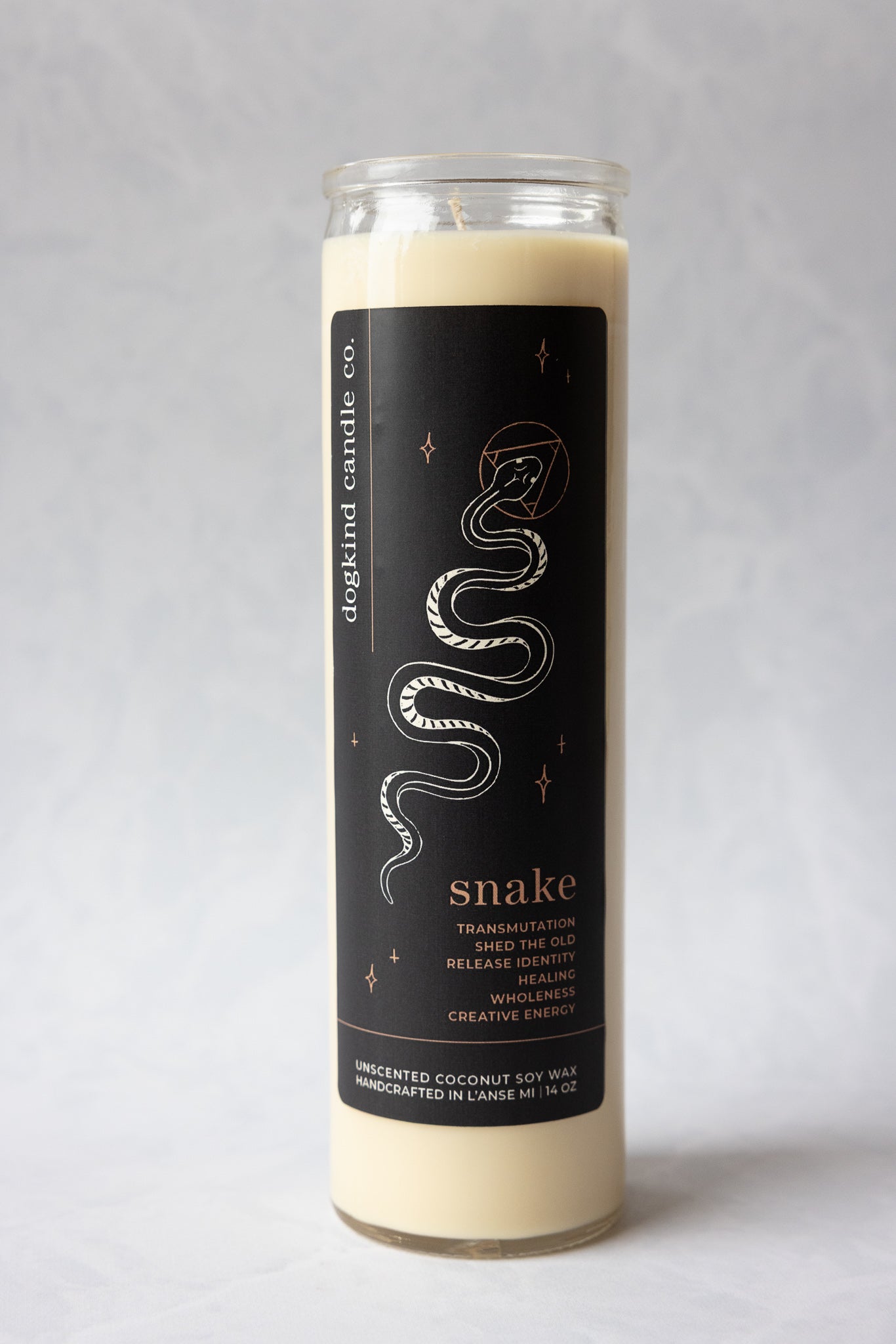 
                  
                    Animal medicine spirit animal unscented Candle with snake design on label against a gray background
                  
                