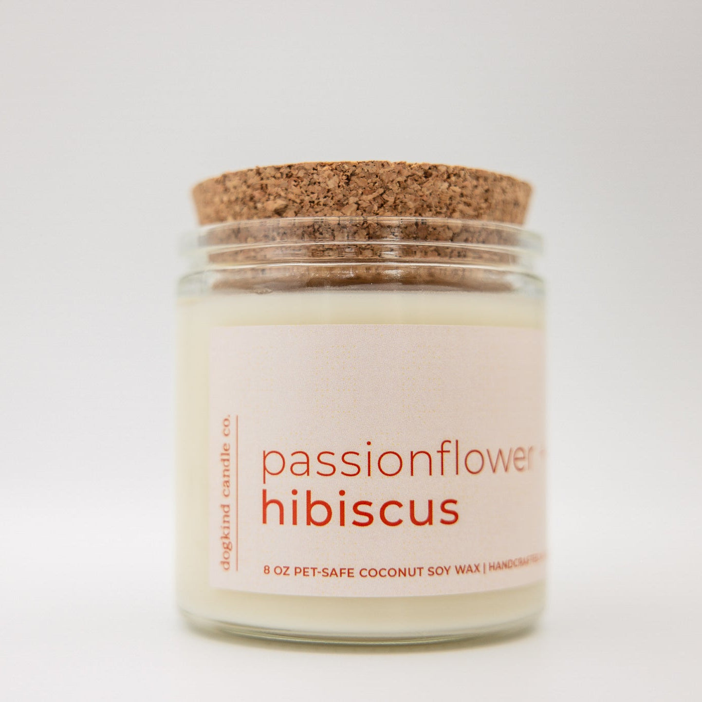 
                  
                    Candle jar labeled 'passionflower hibiscus' with a cork lid on a white background
                  
                