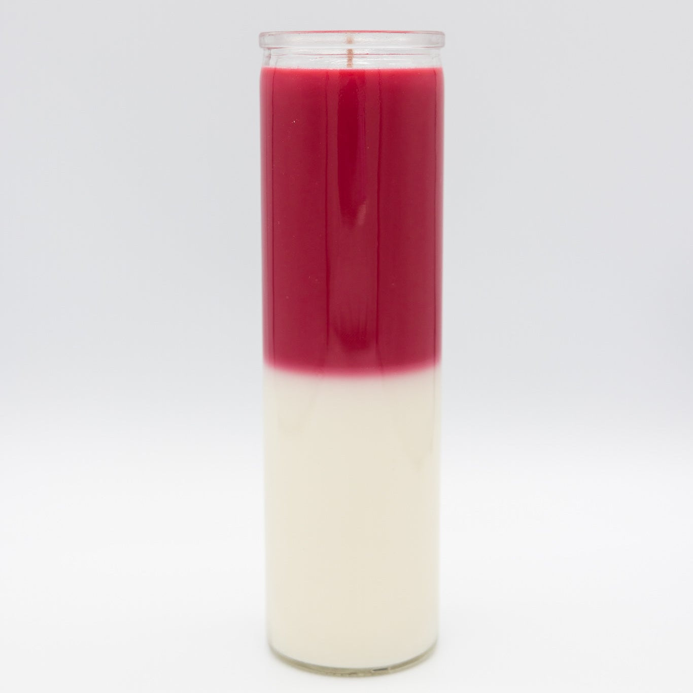 
                  
                    A 7-day prayer candle with two distinct layers: a vibrant dark red wax on top and a creamy off-white wax on the bottom, set against a seamless light gray background.
                  
                