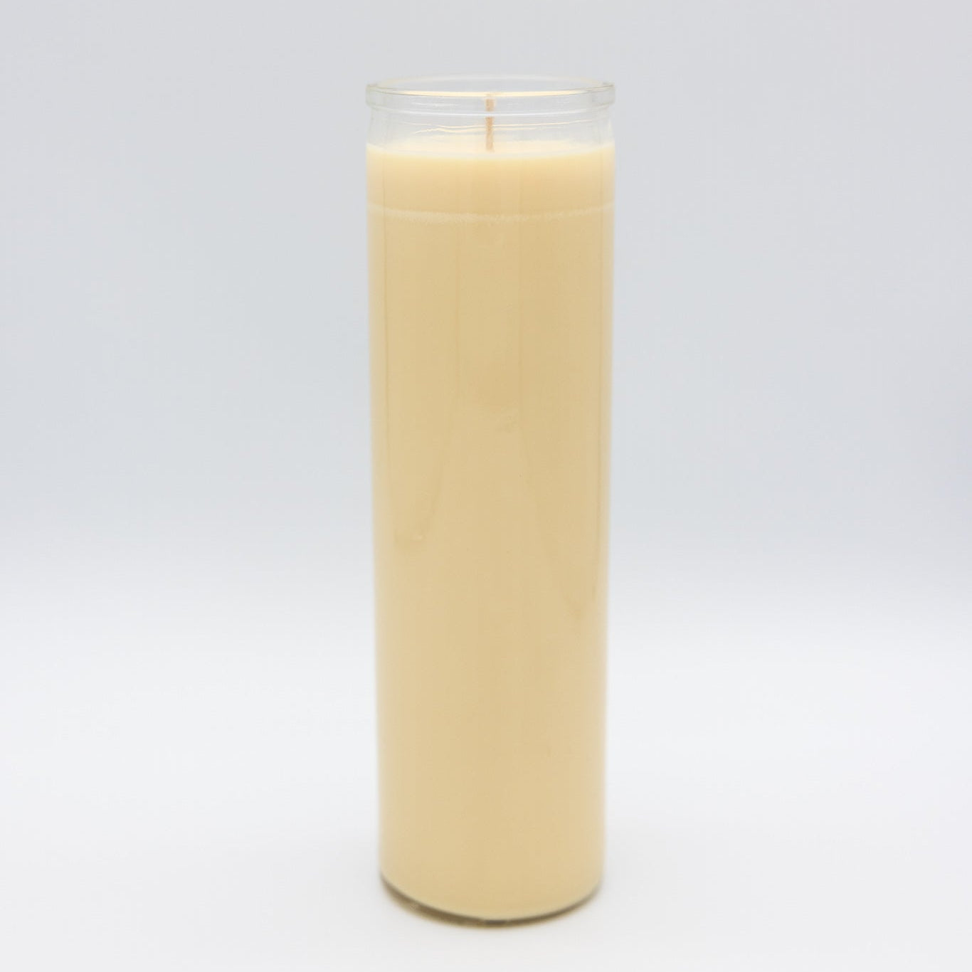 
                  
                    A 7-day prayer candle filled with pale cream-colored wax, standing upright on a seamless light gray background.
                  
                