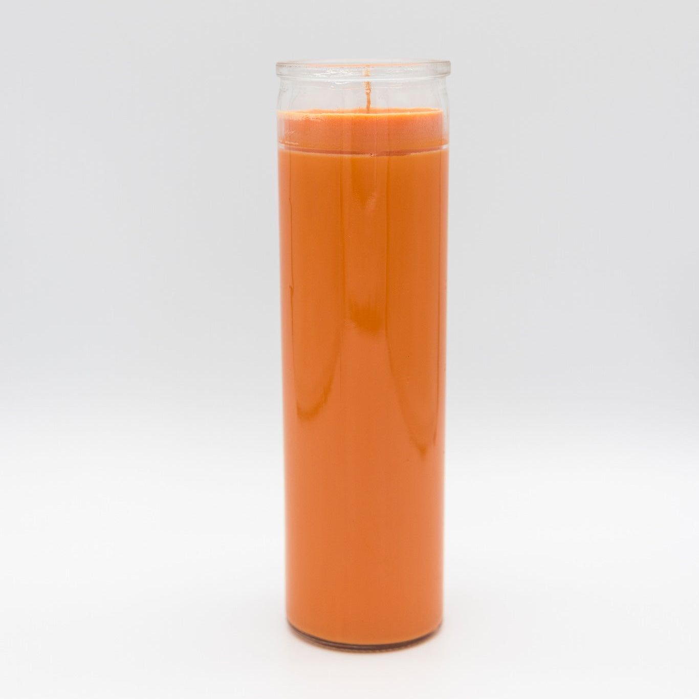 
                  
                    A 7-day prayer candle filled with orange wax, standing upright against a seamless white studio background.
                  
                
