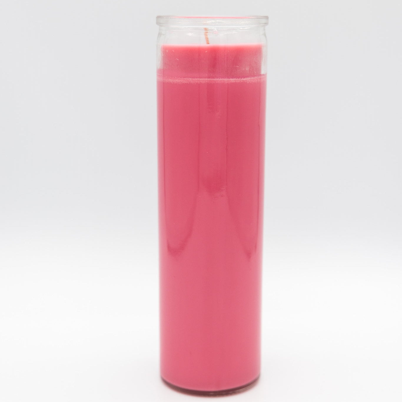 
                  
                    A 7-day prayer candle filled with pink wax and a single wick, set against a seamless light gray background.
                  
                