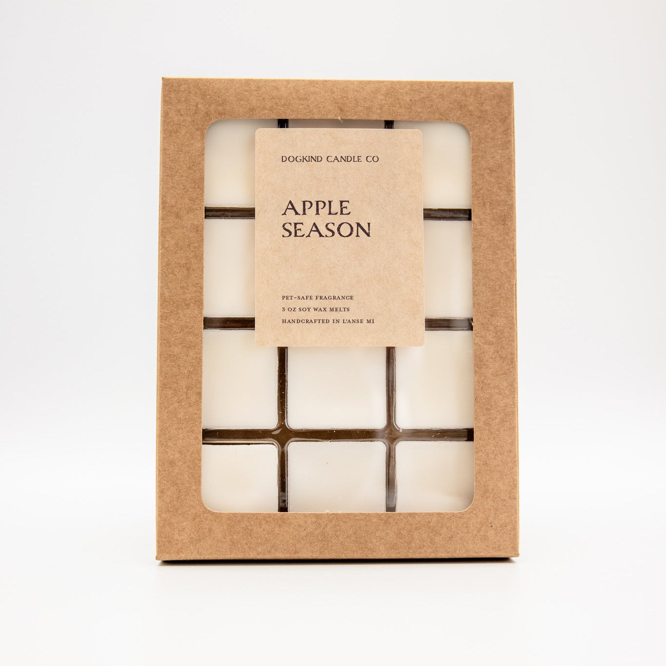A boxed wax melt set from Dogkind Candle Co. labeled 'APPLE SEASON,' shown in a kraft paper window box against a clean white background.